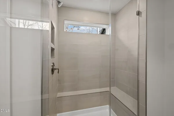 a view of a chairs and table in backyard