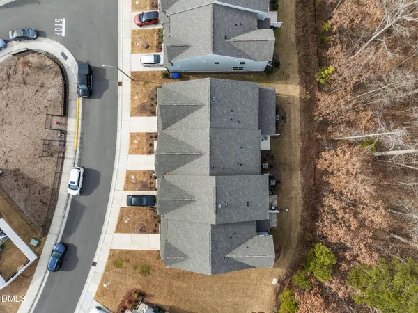 an aerial view of residential house with outdoor space