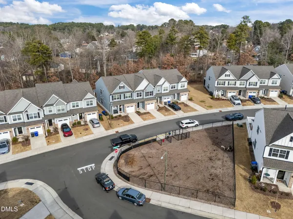 an aerial view of a house with a outdoor space