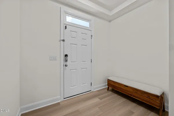a view of room with hardwood wall
