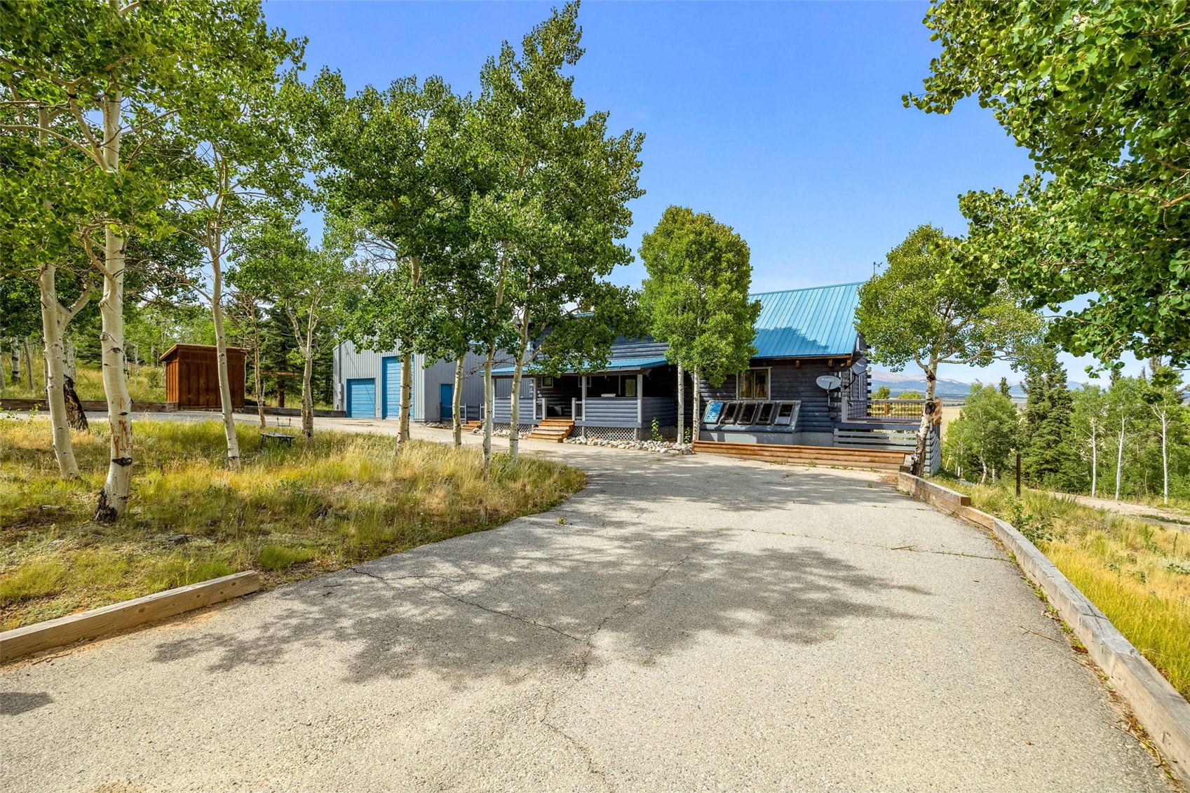 597 Sheep Ridge Road Fairplay, CO 80440 - Photo 3 of 50 a view of a house with a patio