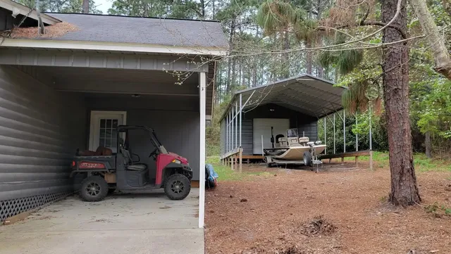 a view of a big yard with a large pool