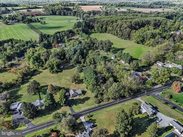 an aerial view of a golf course with a park