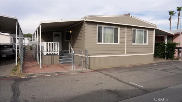 a view of house with garage