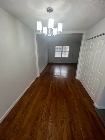 a view of wooden floor and staircase