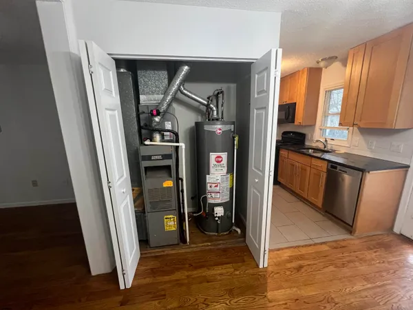 a view of a kitchen from the hallway