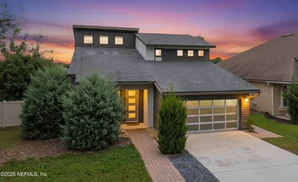 a view of a wooden door of the house