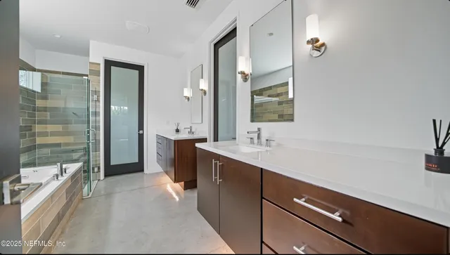 a bathroom with a sink and a washing machine