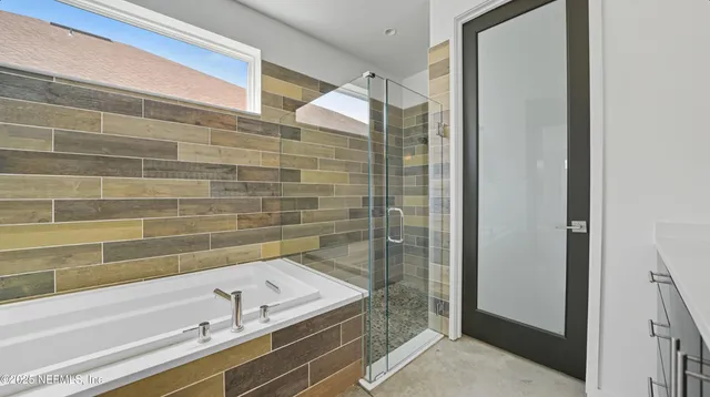 a utility room with a sink dryer and washer