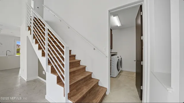 a view of a room with toys and windows