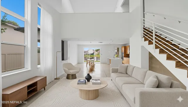 a open kitchen with granite countertop a stove and a sink