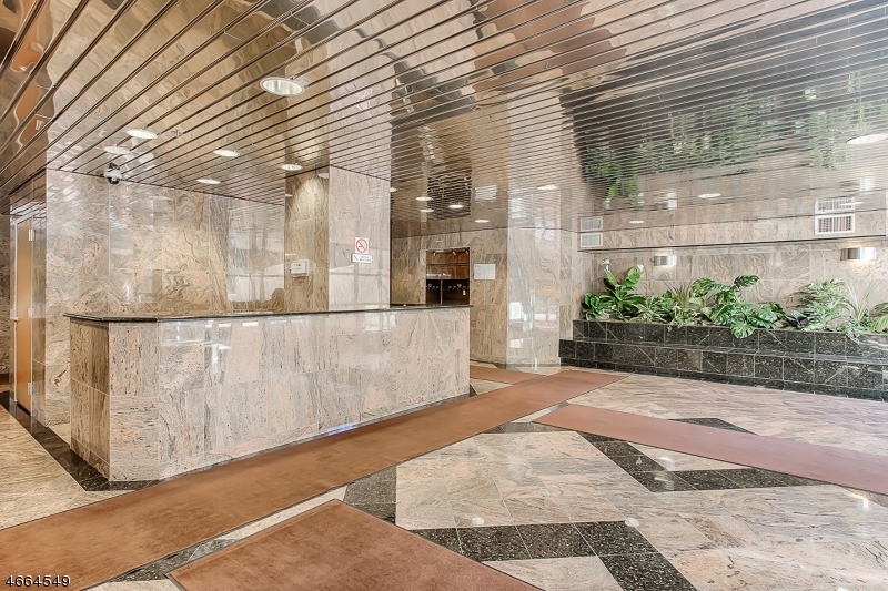 1000 Gates Court, Unit 1047 Morris Plains, NJ 07950 - Photo 16 of 21 a view of a outdoor space of a building