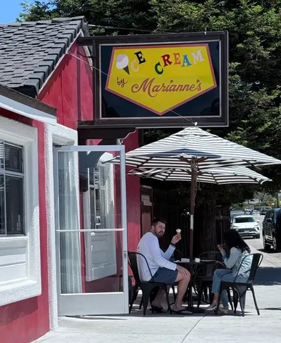 a view of a chairs and table in patio