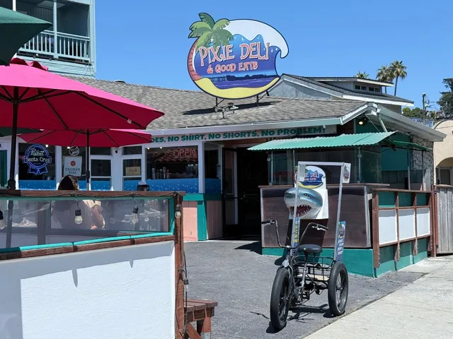 a front view of retail shop with outdoor seating