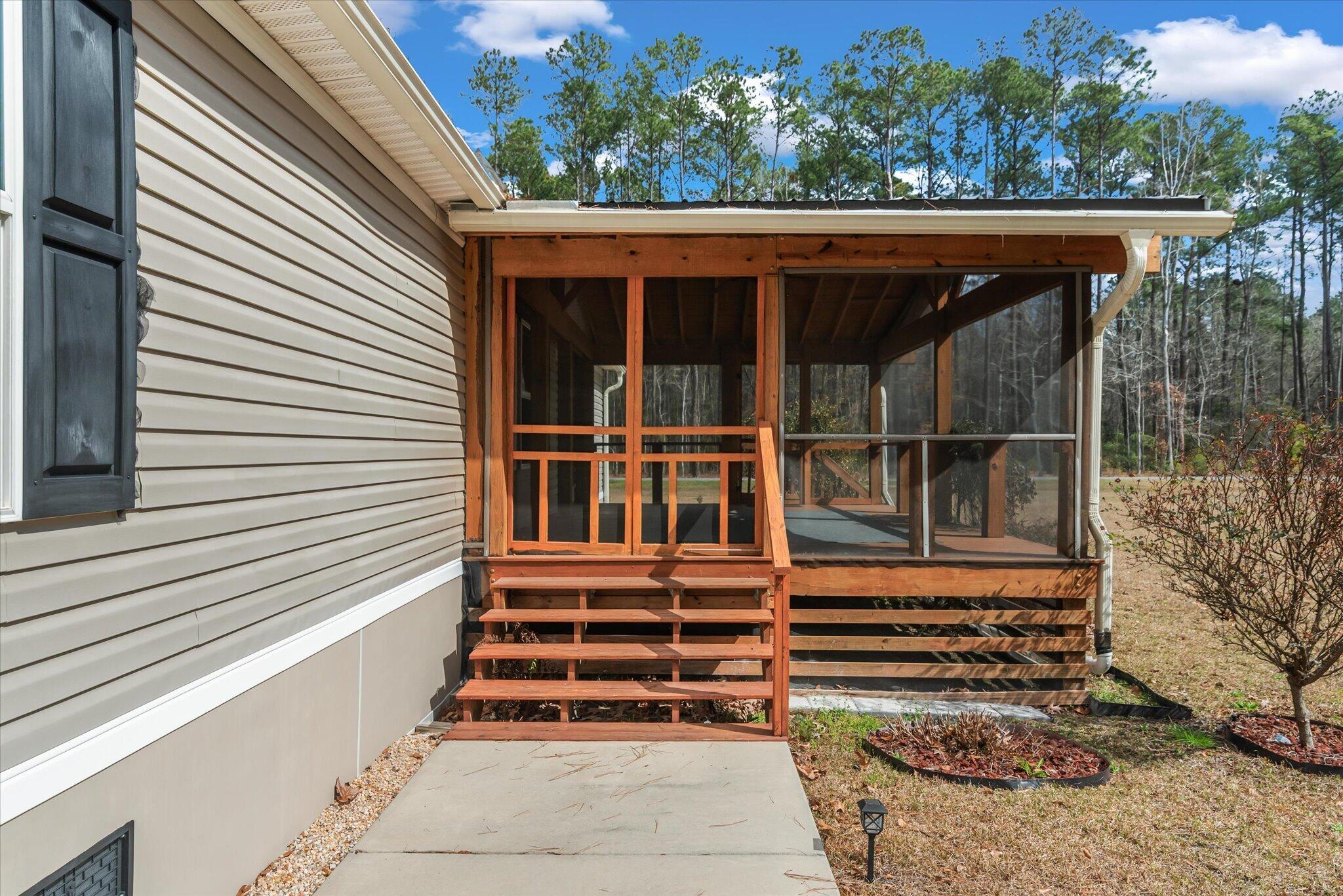 4822 Highway 41 Huger, SC 29450 - Photo 6 of 31 Screen Porch
