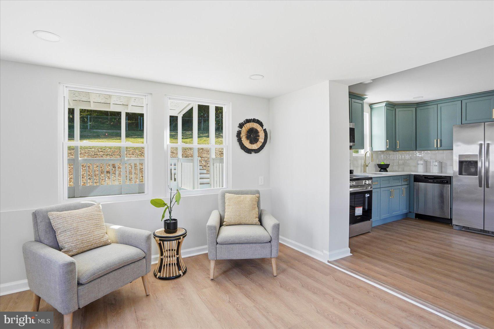 2105 Stringtown Road Sparks Glencoe, MD 21152 - Photo 18 of 57 a living room with furniture and kitchen