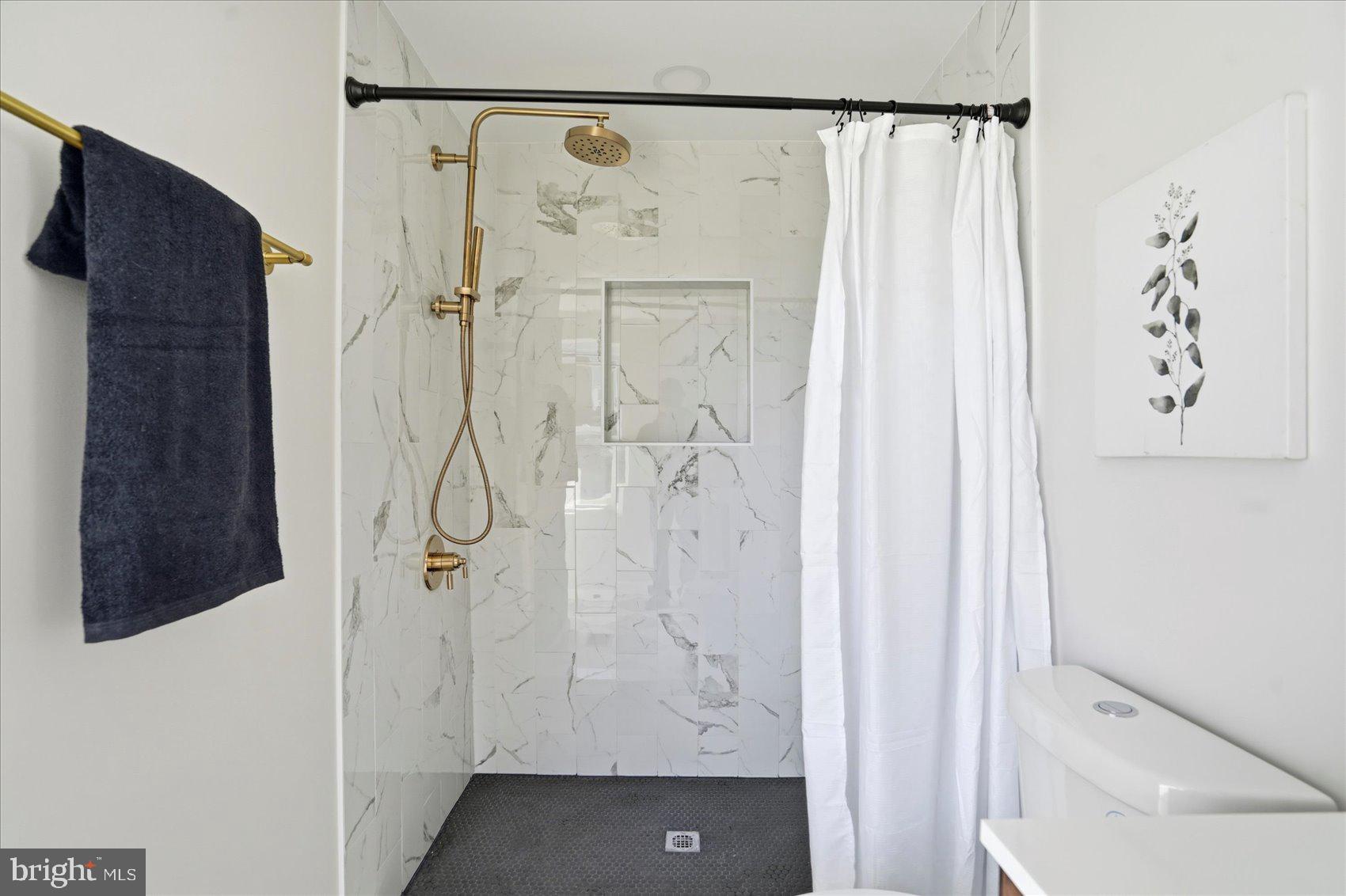 2105 Stringtown Road Sparks Glencoe, MD 21152 - Photo 22 of 57 a bathroom with a shower and a glass door