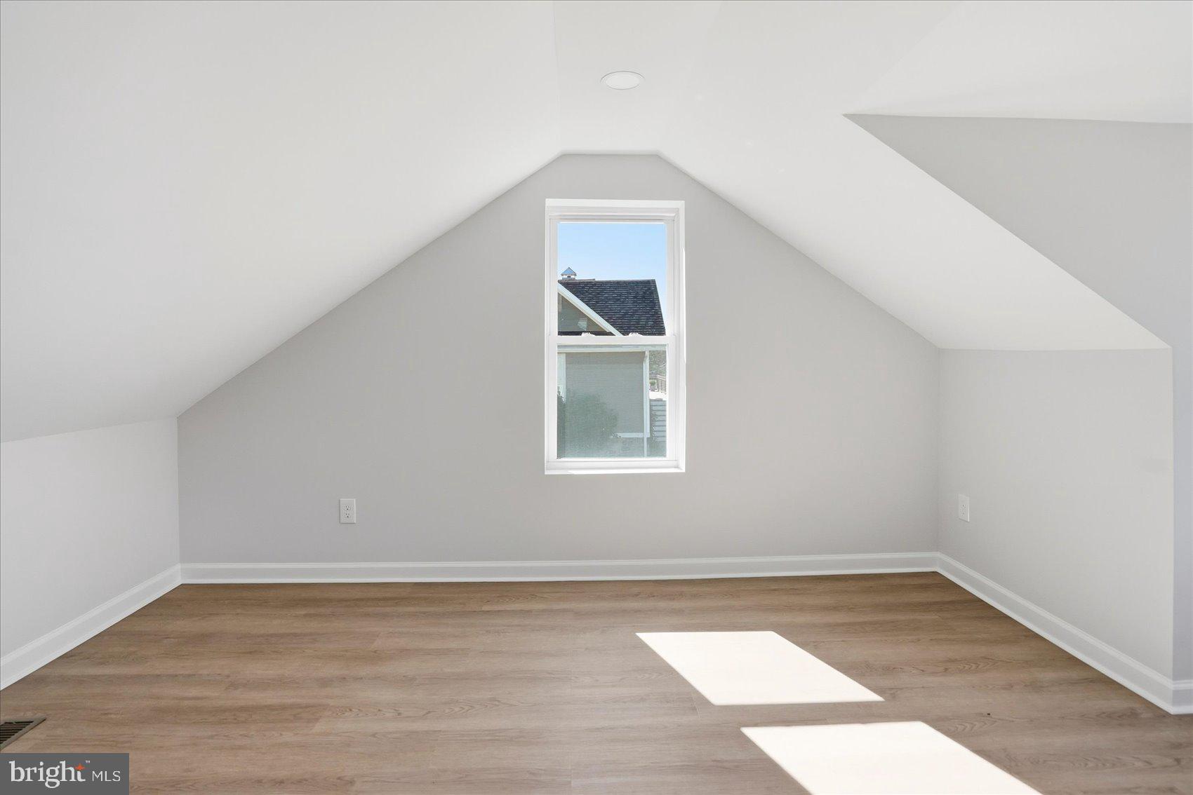 2105 Stringtown Road Sparks Glencoe, MD 21152 - Photo 26 of 57 a view of empty room with wooden floor and fan