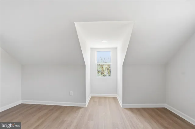 a bathroom with a shower and a toilet