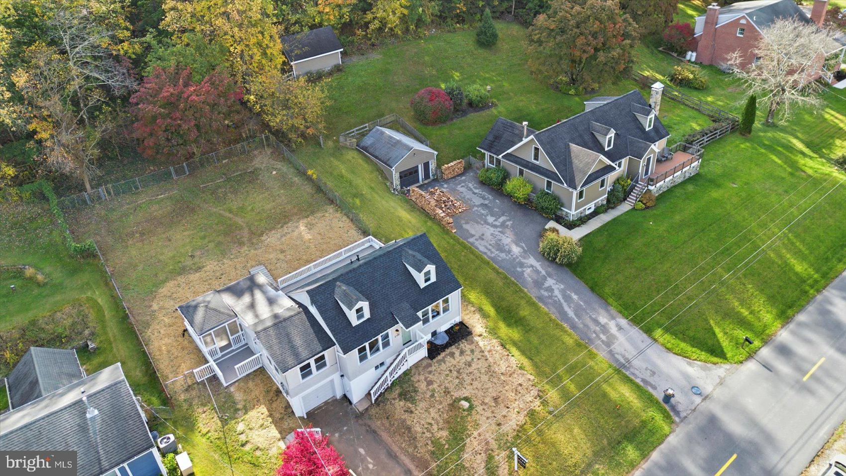 2105 Stringtown Road Sparks Glencoe, MD 21152 - Photo 3 of 57 an aerial view of a house with a garden and swimming pool