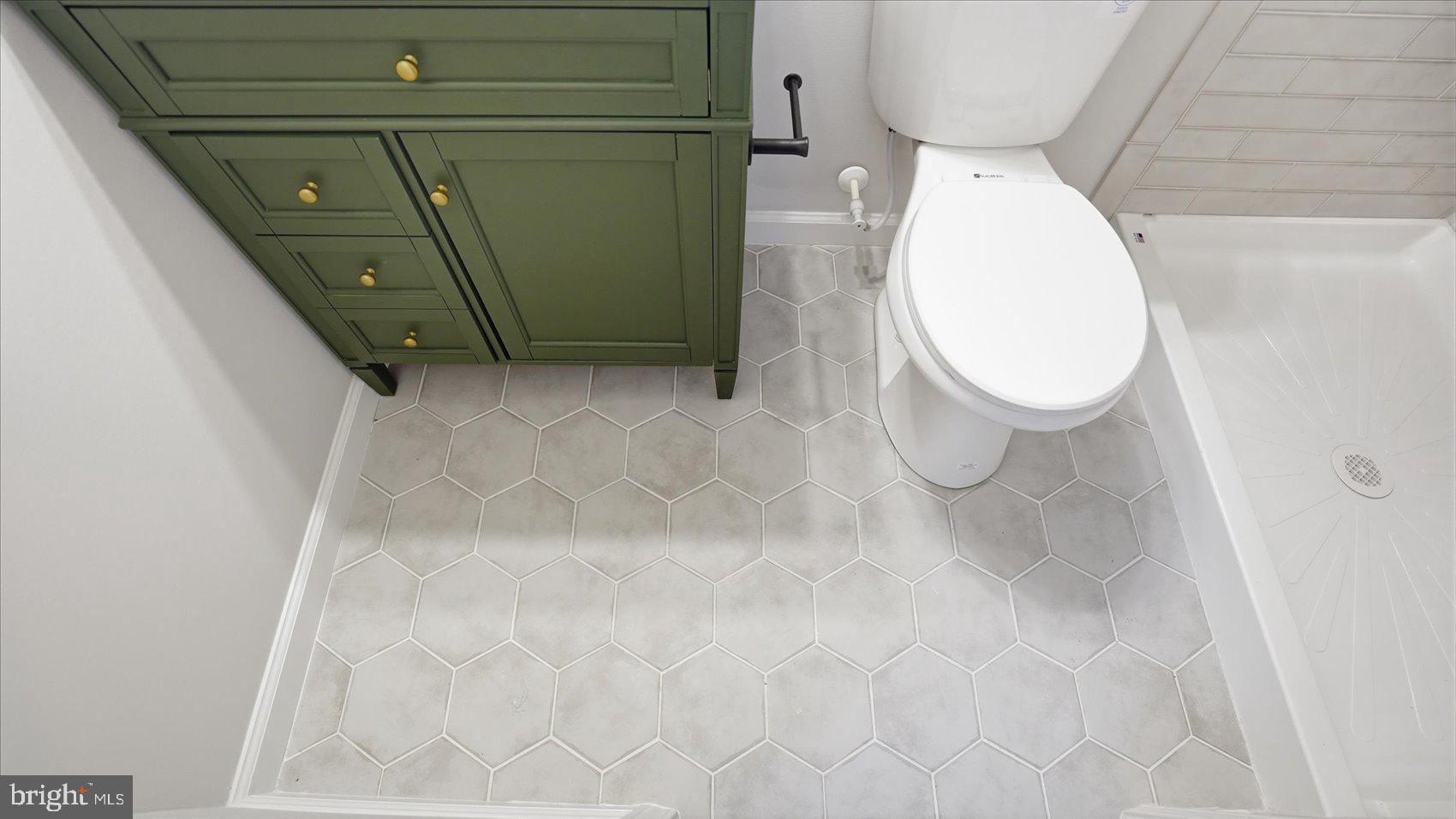 2105 Stringtown Road Sparks Glencoe, MD 21152 - Photo 35 of 57 a bathroom with a toilet and a mirror