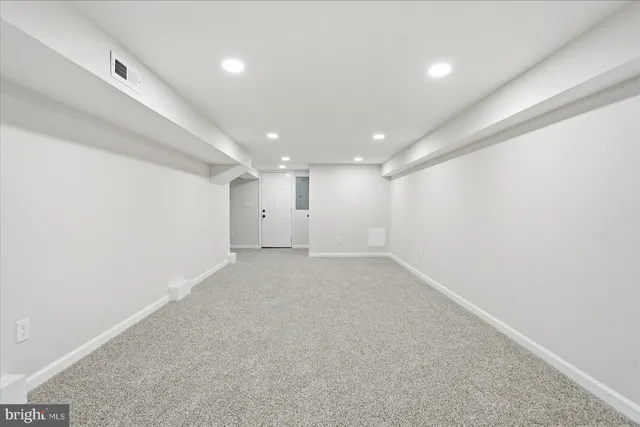 a view of a balcony with wooden floor