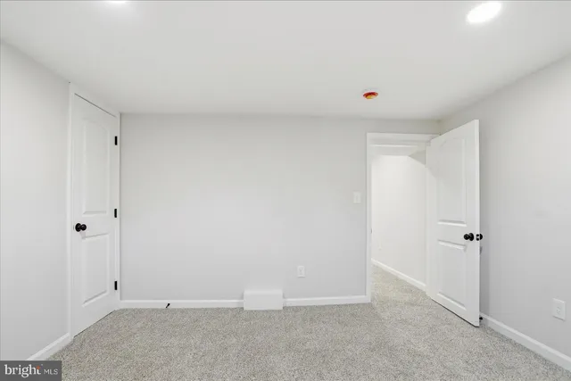 a view of balcony with wooden floor and fence