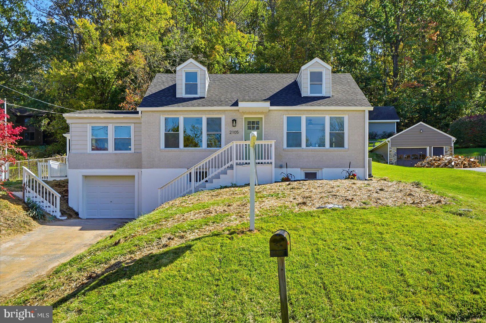 2105 Stringtown Road Sparks Glencoe, MD 21152 - Photo 4 of 57 a front view of house with yard and green space