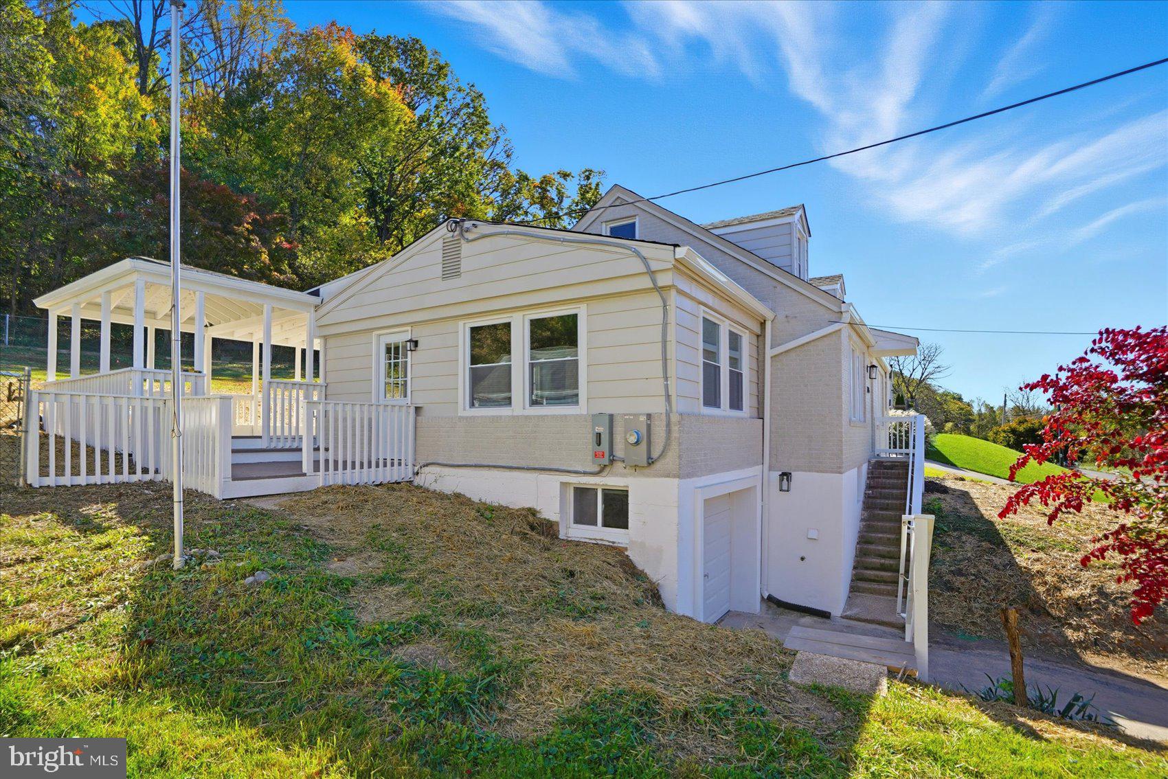 2105 Stringtown Road Sparks Glencoe, MD 21152 - Photo 6 of 57 a front view of a house with a yard