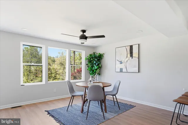 a kitchen with stainless steel appliances a stove and a refrigerator