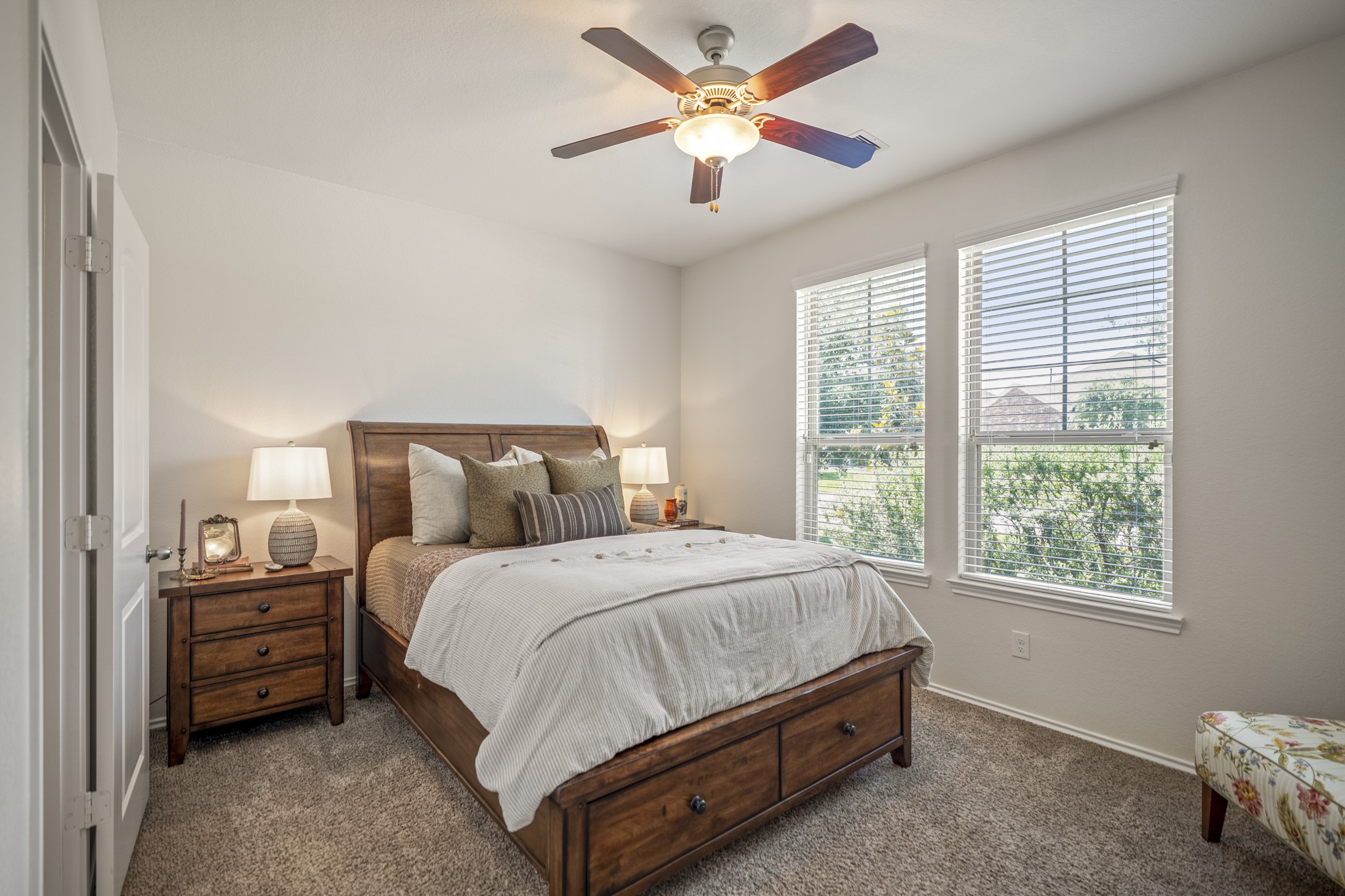 5522 Glenfield Spring Lane Spring, TX 77389 - Photo 21 of 46 Private guest suite warmly covered in abundant natural light & one of three secondary bedrooms.