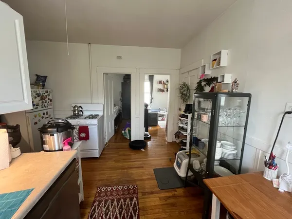 a kitchen with lots of appliances