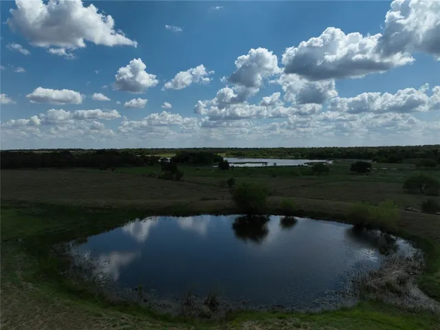 a view of a yard in front of a house