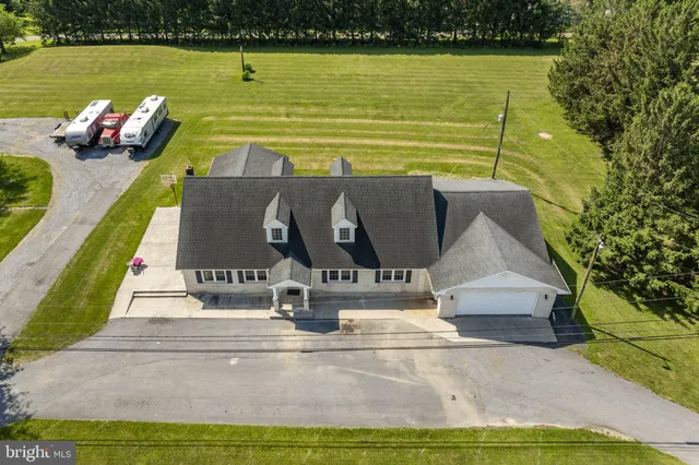 a view of swimming pool with seating space