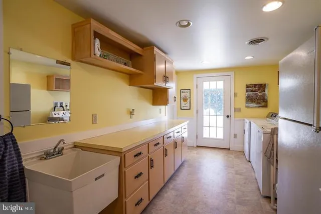 a view of an empty room with empty shelves