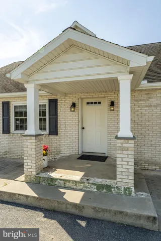 front view of house with a yard