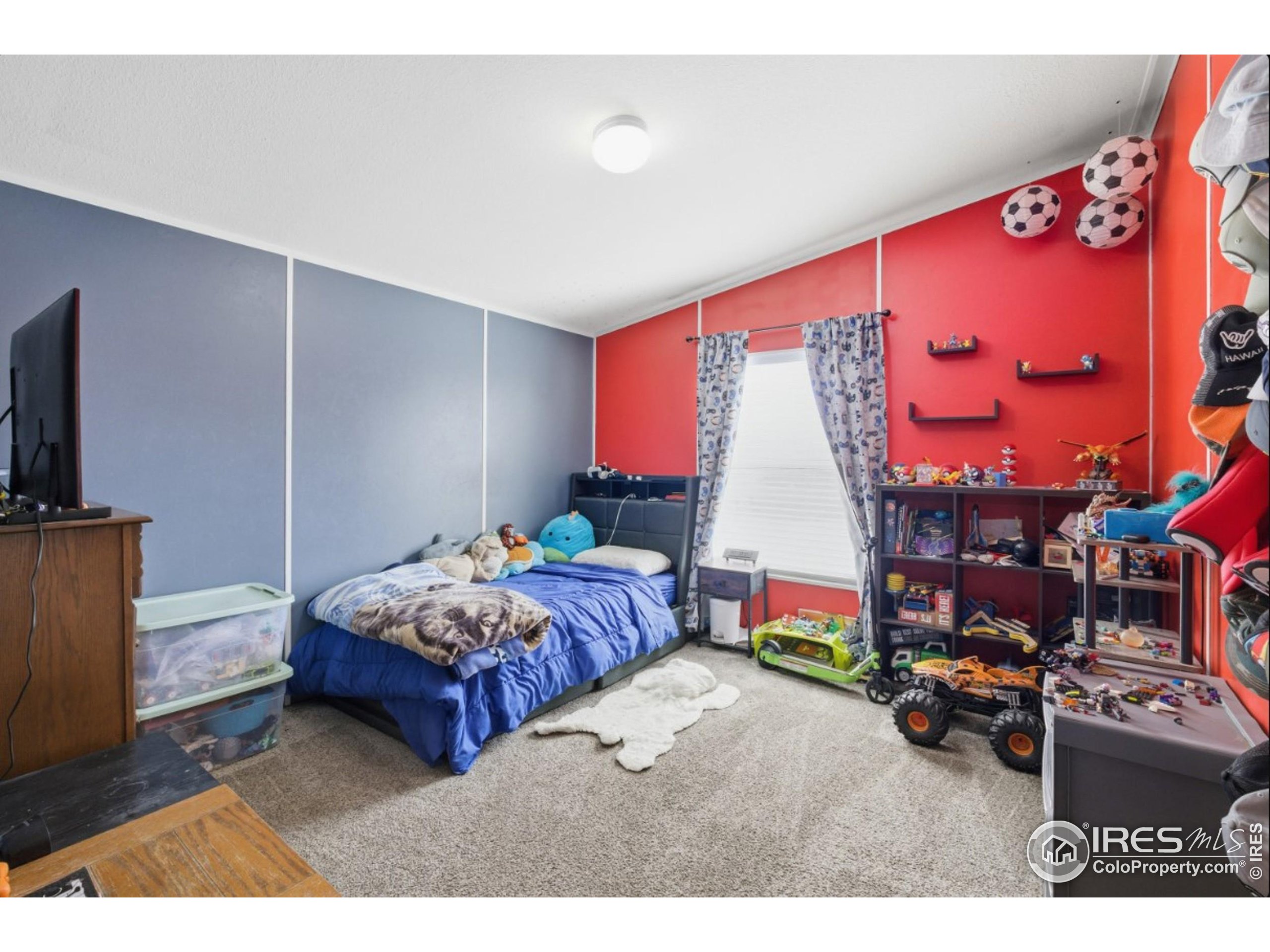 2500 East Harmony Road, Unit 84 Fort Collins, CO 80528 - Photo 14 of 18 a bedroom with bed and a window