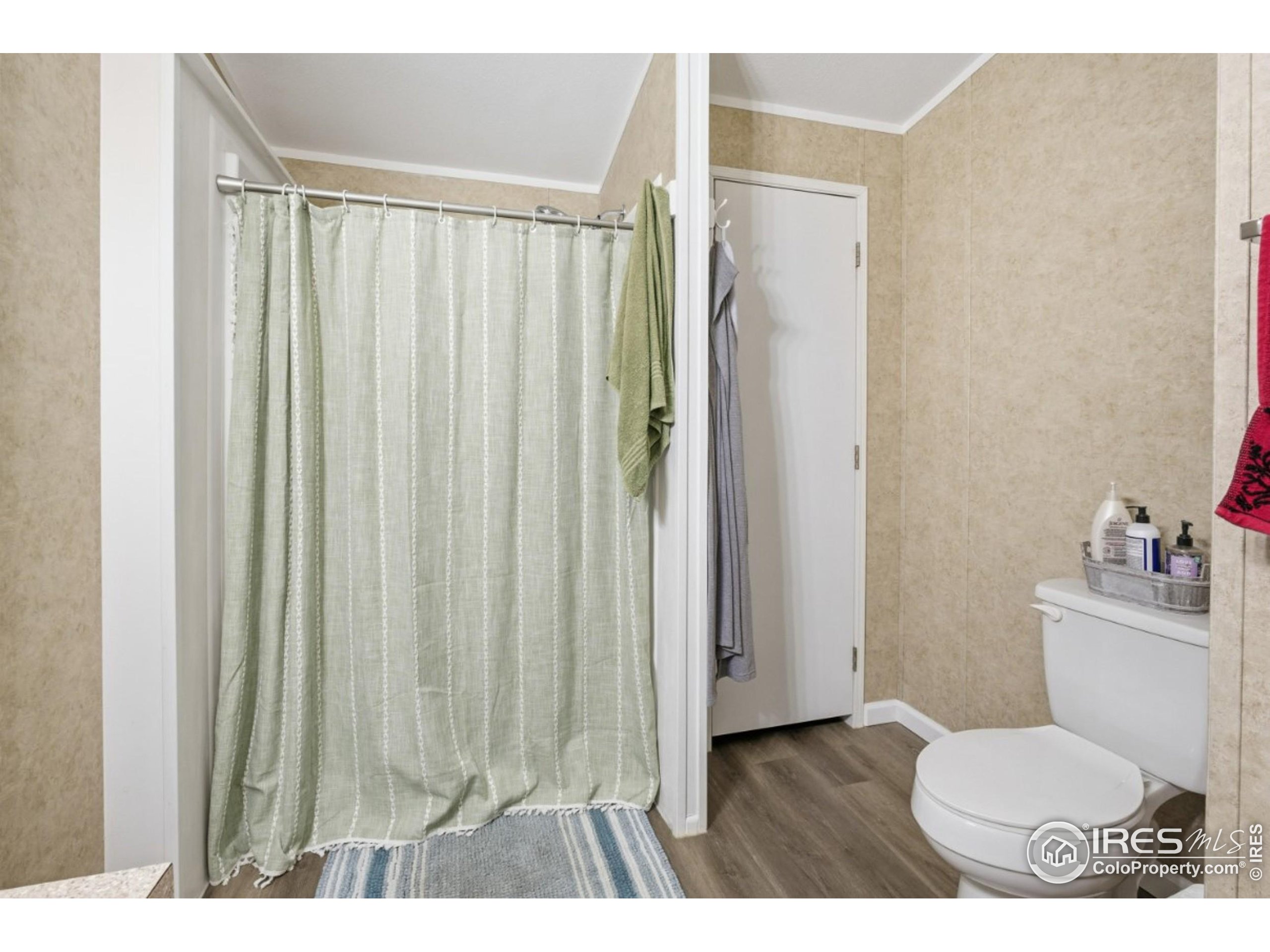 2500 East Harmony Road, Unit 84 Fort Collins, CO 80528 - Photo 16 of 18 a bathroom with a sink toilet and shower