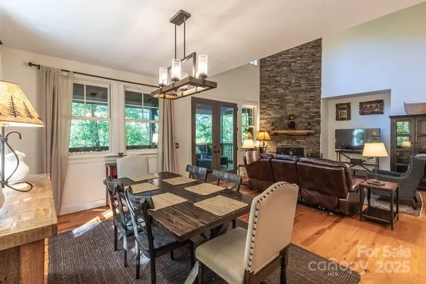 a view of a dining room with furniture window and outside view