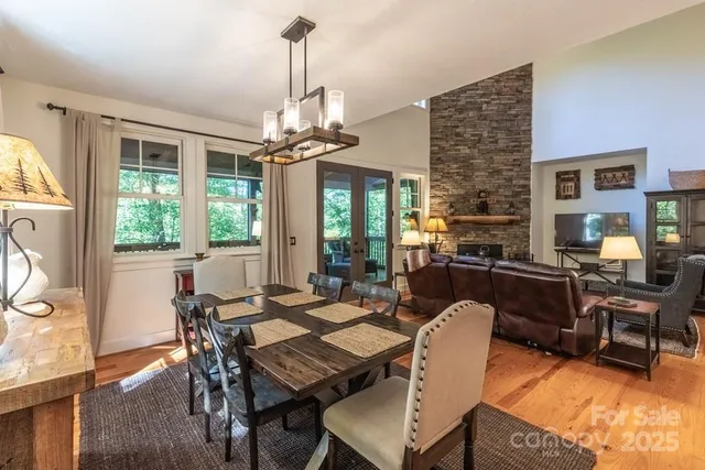 a view of a dining room with furniture window and outside view
