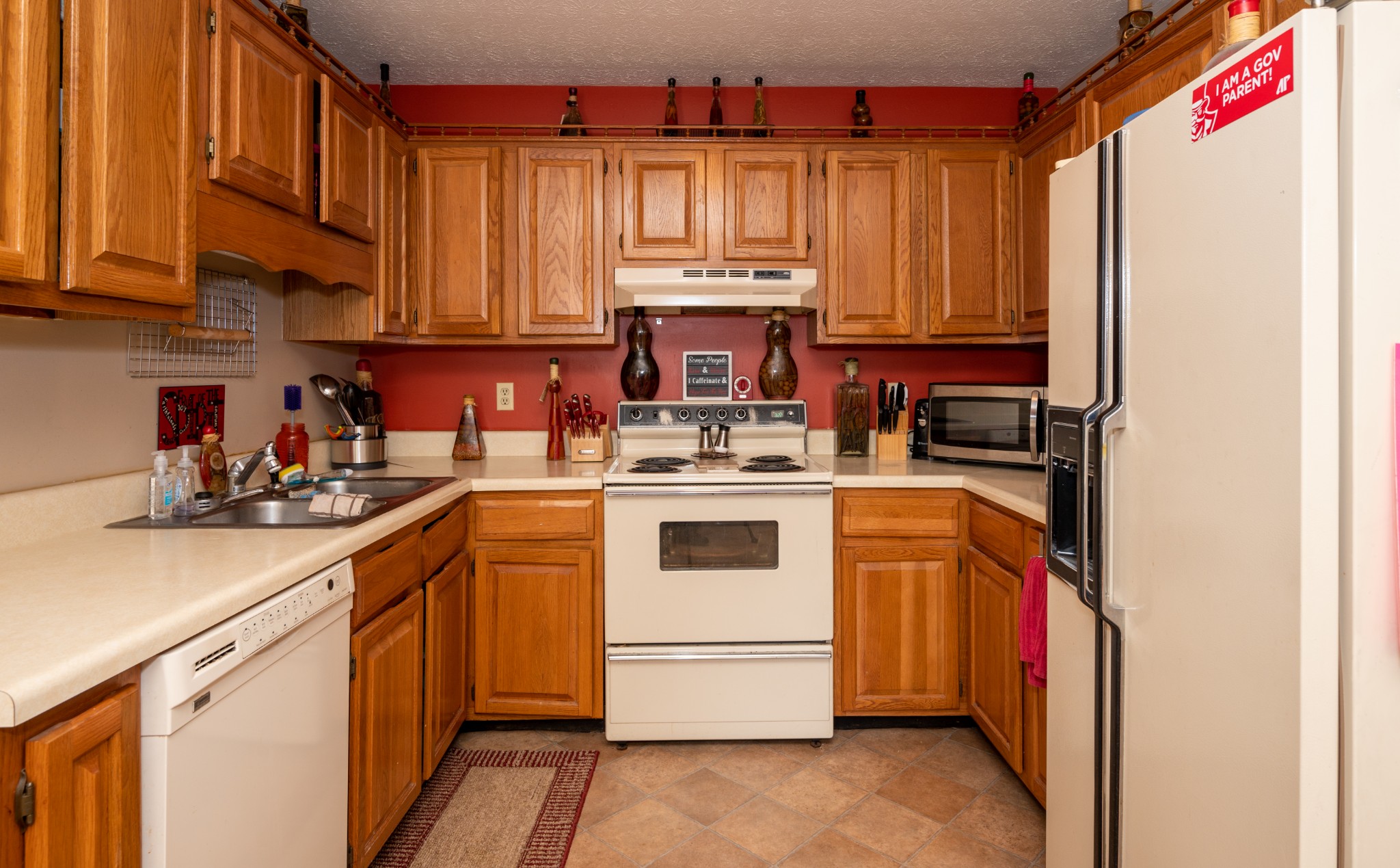 2021 Jack Teasley Road Pleasant View, TN 37146 - Photo 11 of 17 a kitchen with stainless steel appliances granite countertop a stove a sink and a refrigerator
