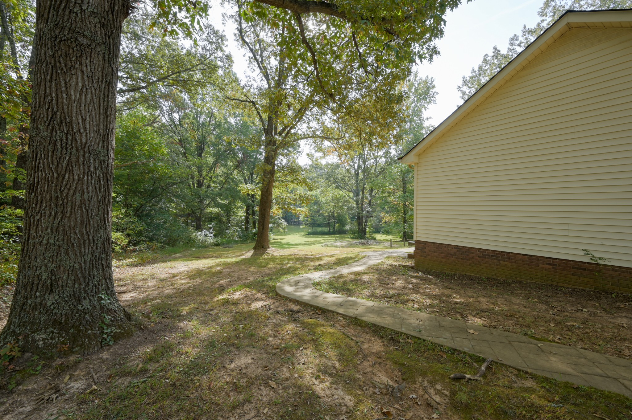 2021 Jack Teasley Road Pleasant View, TN 37146 - Photo 2 of 17 a view of a yard with large tree