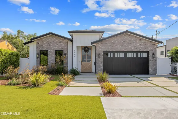 a house view with a outdoor space