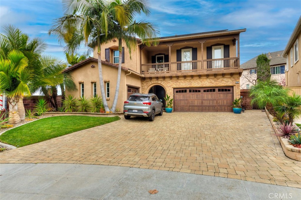 a house view with a garden space