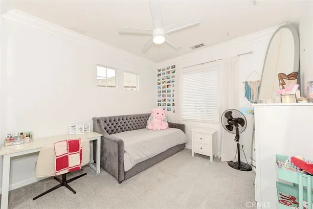 a bedroom with furniture and bed