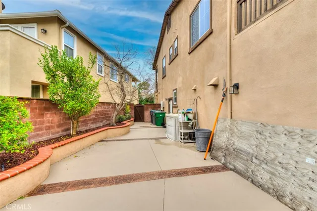 a view of a street with a building in the background