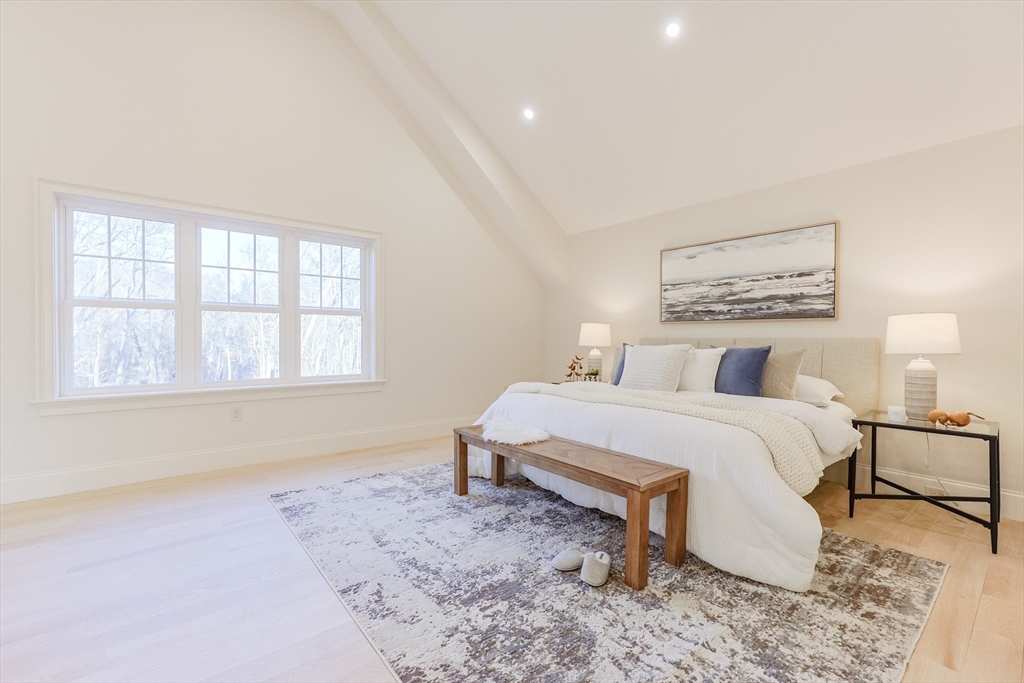 54 Woodland Road Scituate, MA 02066 - Photo 14 of 30 a bedroom with a bed and a window