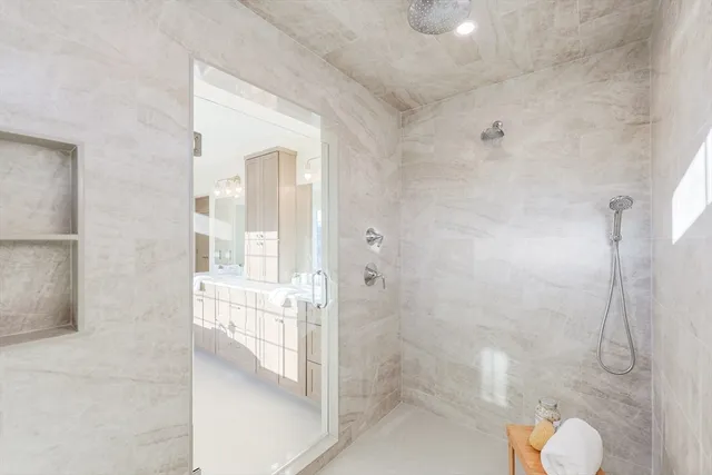 a view of an empty room with a closet