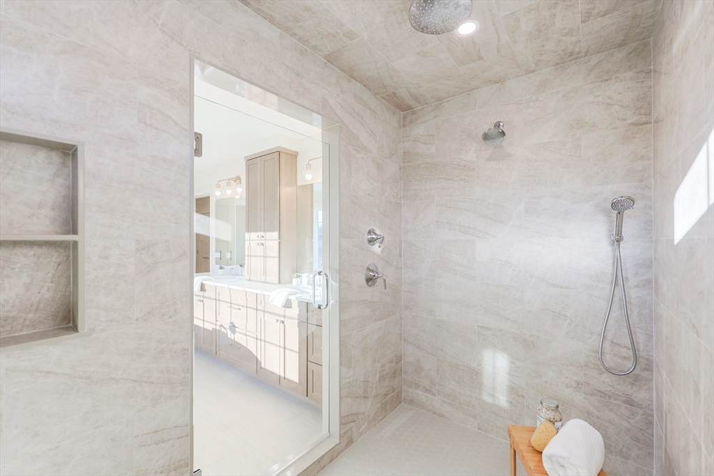 54 Woodland Road Scituate, MA 02066 - Photo 18 of 30 a bathroom with a granite countertop shower mirror and toilet