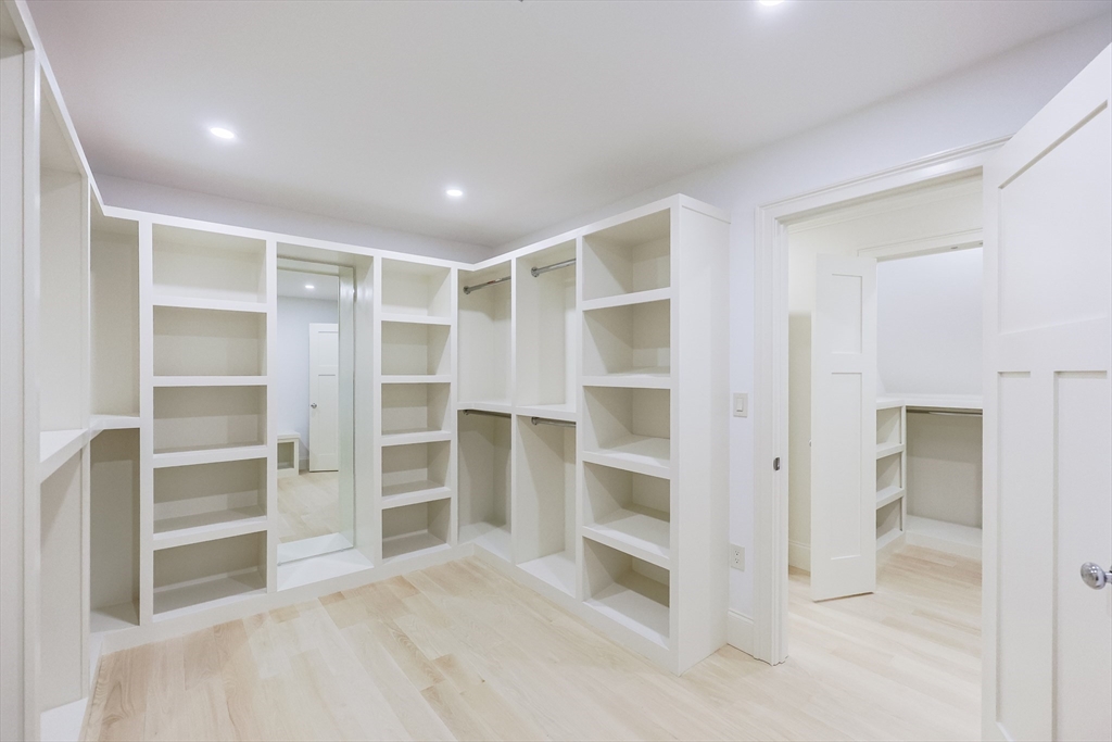 54 Woodland Road Scituate, MA 02066 - Photo 19 of 30 a view of an empty room with a closet